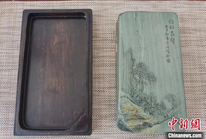 圖為盧保勝為提升洮硯文化內(nèi)涵，制作“一硯一銘、一盒一拓”成品展示?！堟?攝